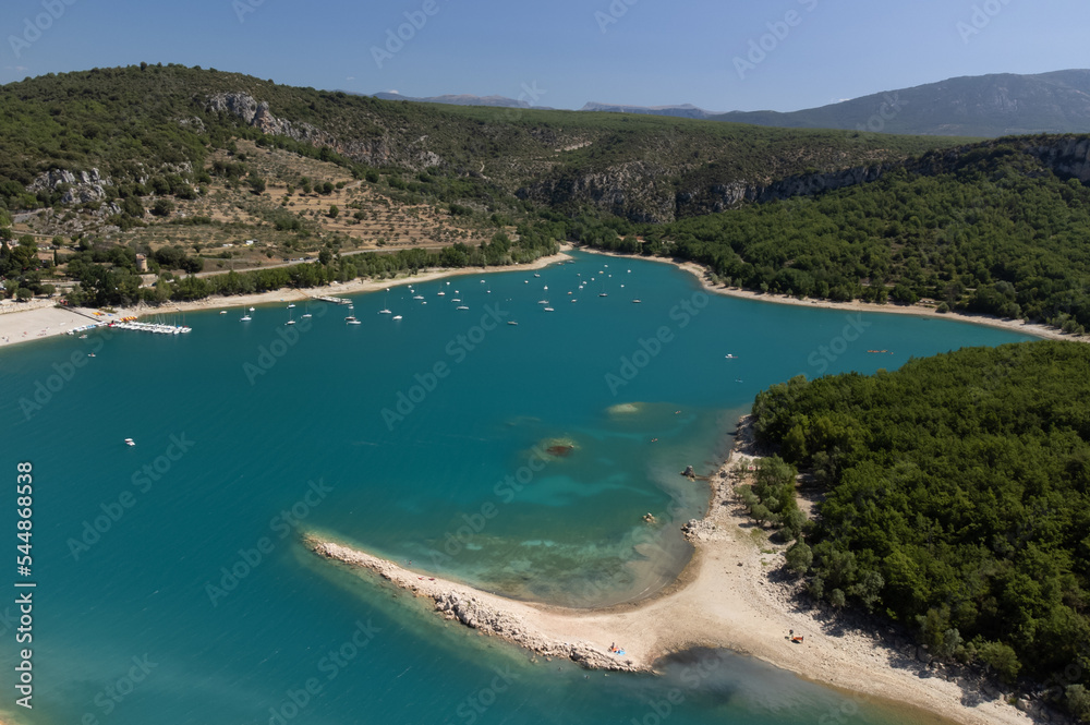 Obraz premium Aerial view on blue lake Sainte-Croix-du-Verdon and villages on cliffs, tourists destination in France