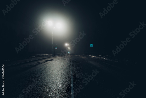 Fotobehang Dark foggy noire rainy street, empty road