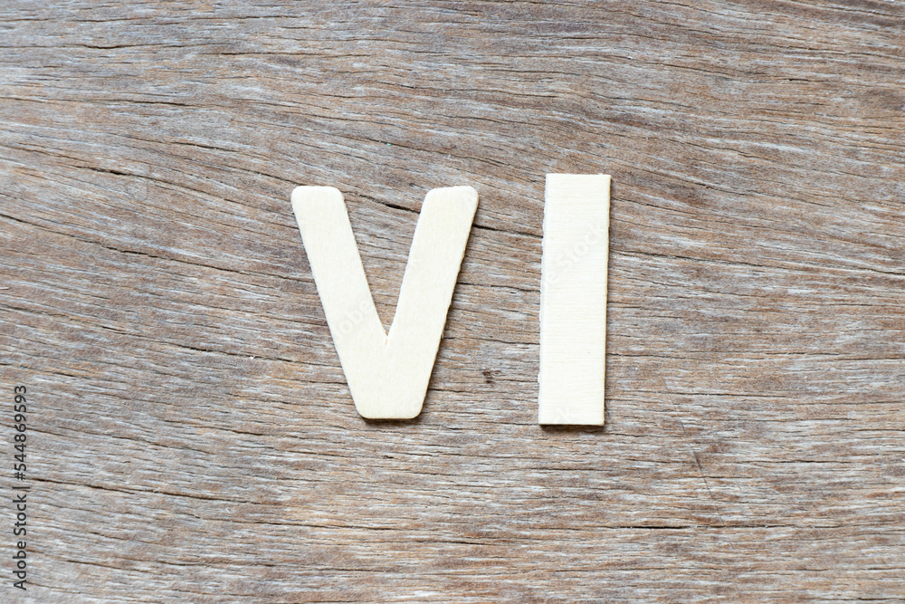 Alphabet letter in word VI (abbreviation for value investor) on wood ...