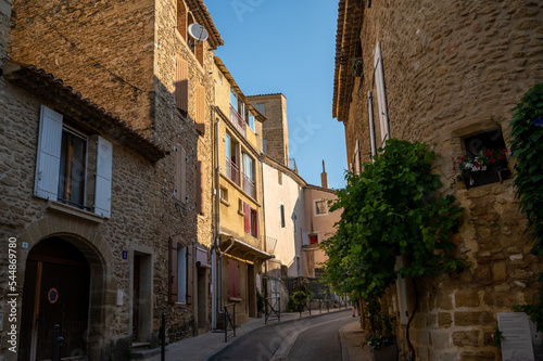 Fototapeta Naklejka Na Ścianę i Meble -  VIew on medieval buildings in sunny day, vacation destination wine making village Chateauneuf-du-pape in Provence, France