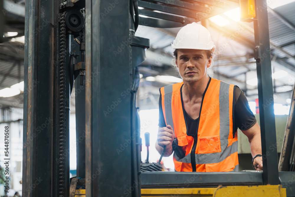 Folk lift driver lifts the customer package Folk lift driver lifts the customer package