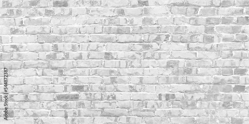 White grunge brick wall background. Close-up bright vintage brick wall background.