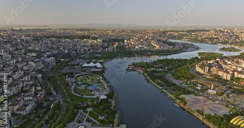 Istanbul Turkey Aerial v33 panoramic panning view capturing golden horn urban waterway and downtown cityscape across eyüpsultan and beyoğlu at sunrise - Shot with Mavic 3 Cine - July 2022 photo