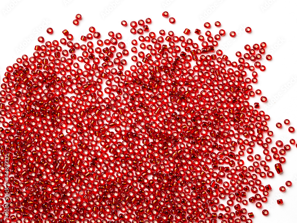 Colorful  Red Plastic Beads on White Background