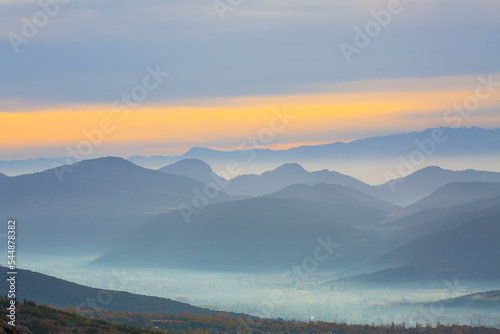 Taurus mountains, early day fog and autumn. photo