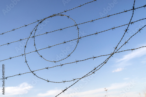 barbed wire fence and barbed wire in the form of golden ratio