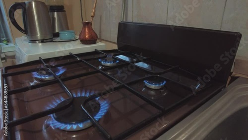 blue natural gas burns gas stove on all burners ecology energy crisis concept. High quality 4k footage