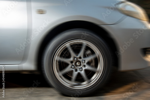 Car motion blur, spinning wheel, blurry image, blurry, background © chalermphon