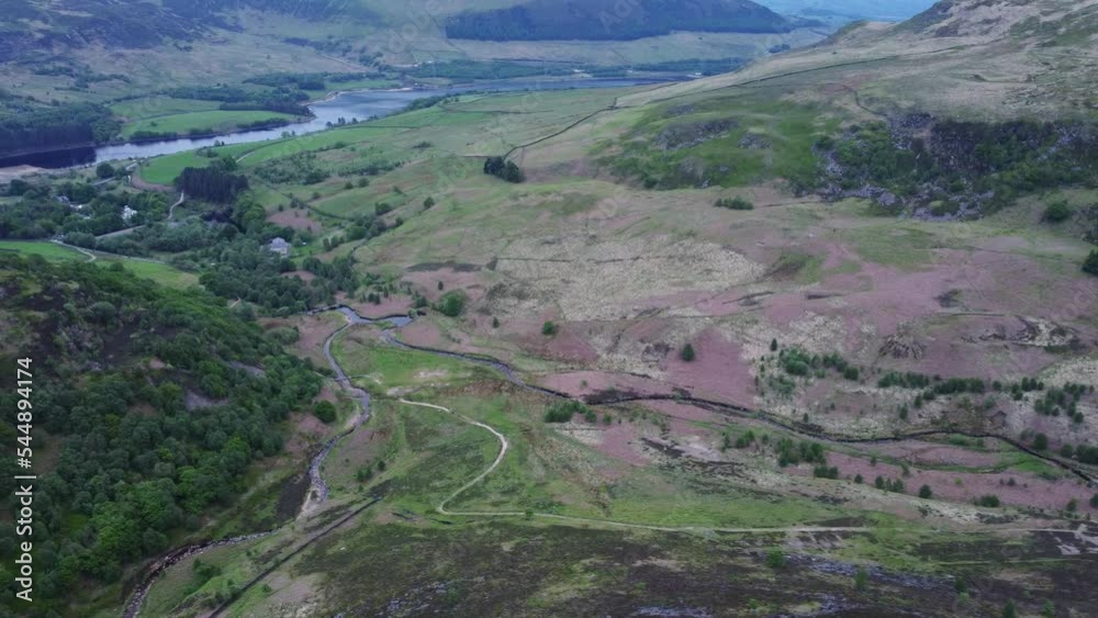 Fields, forest and river as usual rural England landscape in Peak District, Yorkshire. Aerial shot Fields, forest and river as usual rural England landscape in Peak District, Yorkshire. Aerial shot