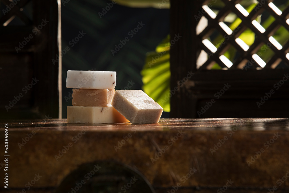 Close up view of few pieces of soap on natural background