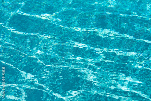 Wallpaper Mural Background of blue water in swimming pool with sun reflection, ripple water wave in pool. Clear water background. Torontodigital.ca