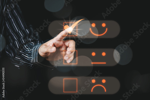 Customer service and Satisfaction concept Men's hands doing online assessments in the satisfaction rating the popular service company allows customers in order to improve and develop the organization