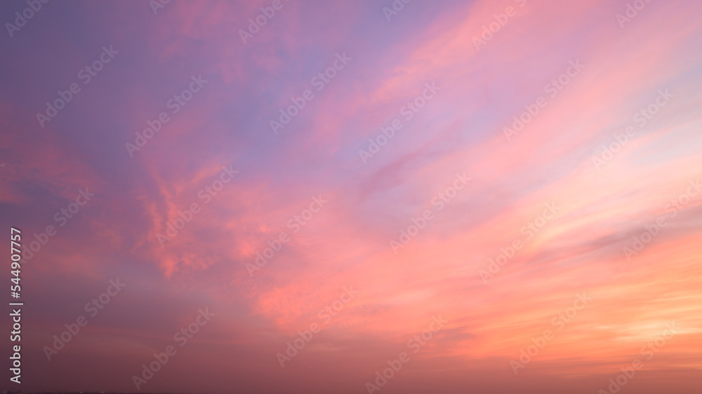 Twilight sky with effect of light pastel tone. Colorful sunset of soft clouds for background abstrac concept,