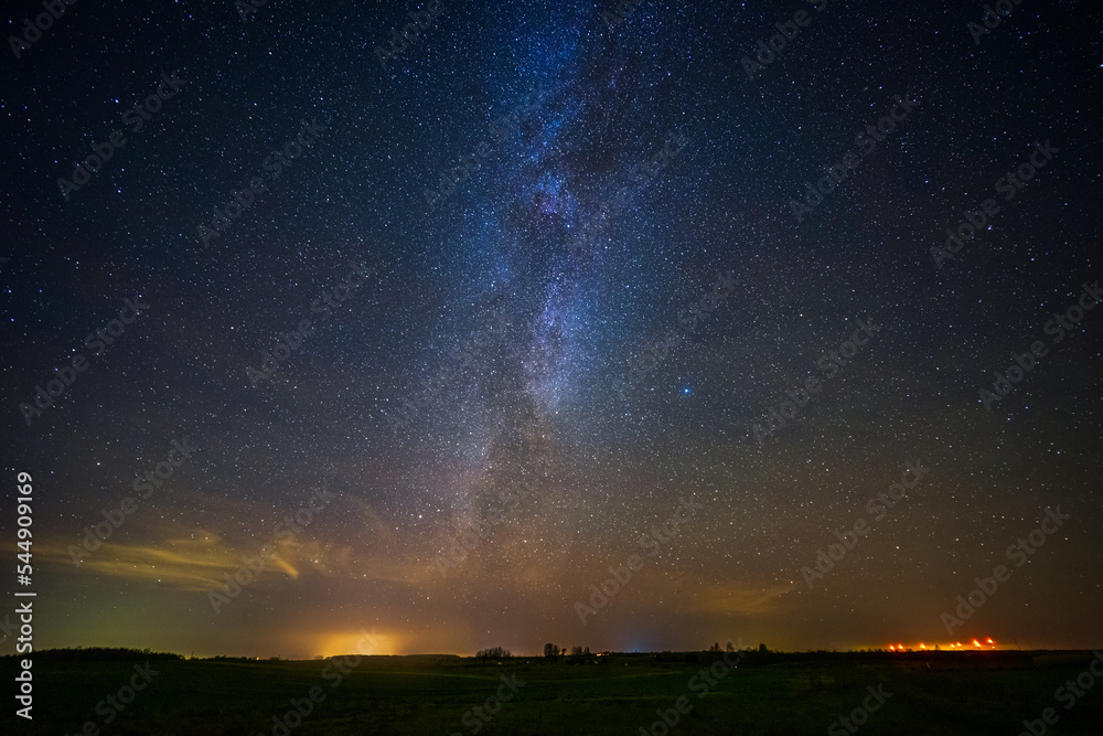 Night landscape with colorful Milky Way, autumn sky