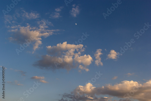 clouds in the sky lit by the sun on a summer day. background © Oleh Marchak
