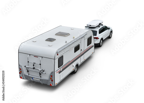 Fototapeta car with caravan trailer on isolated background (spin motion wheels)