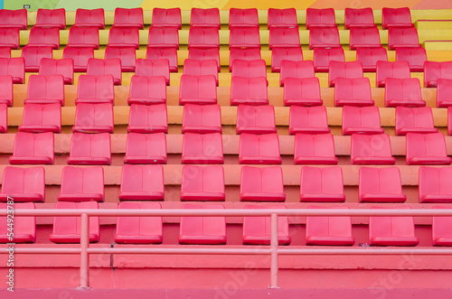 The red sport seat grandstand in an empty stadium.