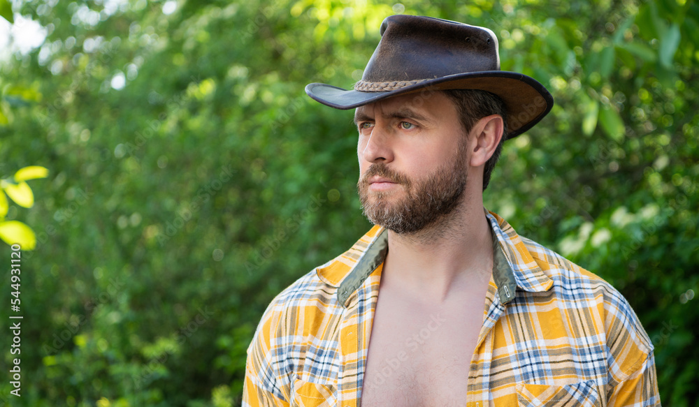 farmer man in cowboy hat. sexy man in checkered shirt. western man wearing hat