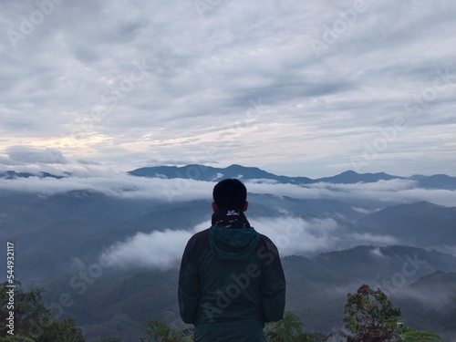 hiker on top of mountain