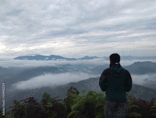 person on the top of mountain