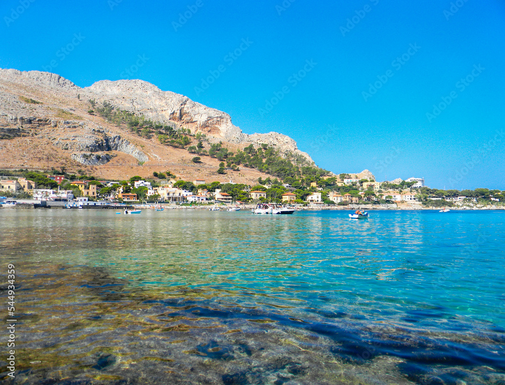Sferracavallo, Province of Palermo, Sicily, Italy. With rocky coast and blue sea, coastal stones and nobody. Here on a sunny day.