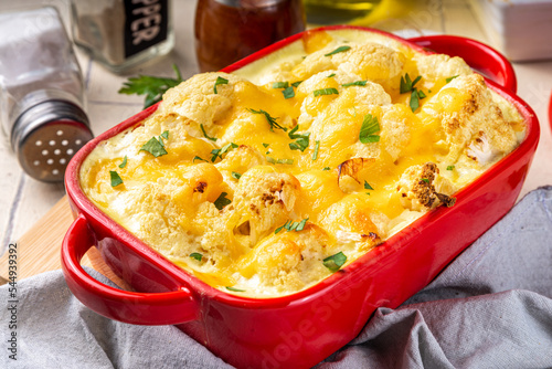 Obraz na plátně Loaded cheesy vegetable cauliflower casserole, with creamy sauce, baked autumn v