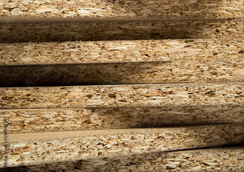 the background is made of untreated mdf slabs laid out with a cut end