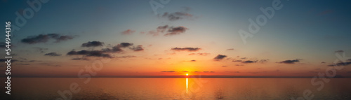 Dramatic Colorful Sunset Sky over Mediterranean Sea. Cloudscape Nature Background. Panorama