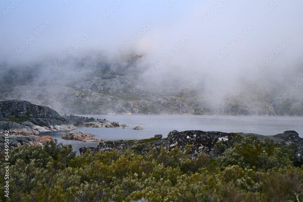 Foggy lake landscape in Portugal, Serra da Estrela. 