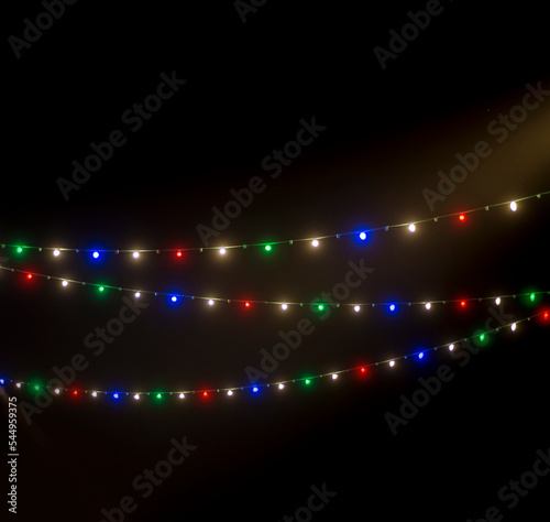 Illuminated decorative lighting for UAE national day celebration. Christmas lights in UAE national flag colors.