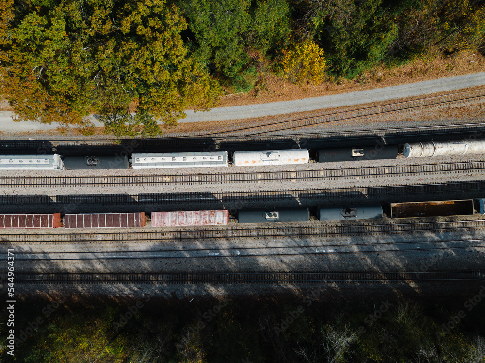 Aerial of trains on rail in autumn Aerial of trains on rail in autumn