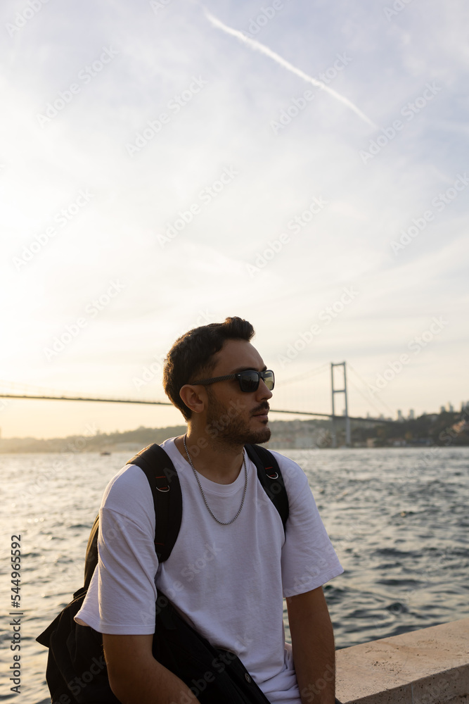 A man posing on bosphorus bridge. Istanbul, Turkey. A man posing on bosphorus bridge. Istanbul, Turkey.