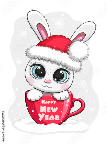 New Year's winter rabbit bunny in a red hat with a bumbon sits in a red mug with the text it's snowing photo