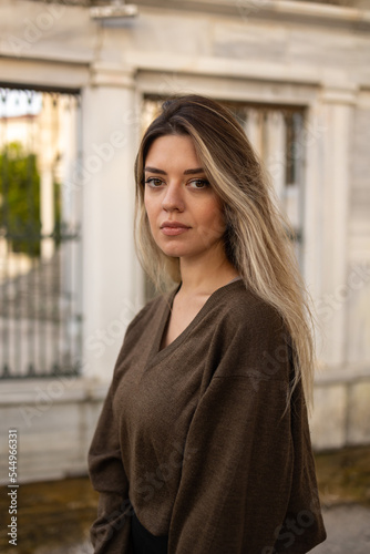 Close up photo of young beautiful woman. Portrait at outside.