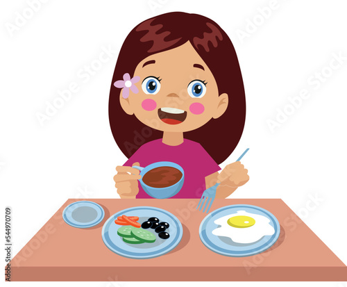 cute little boy having breakfast