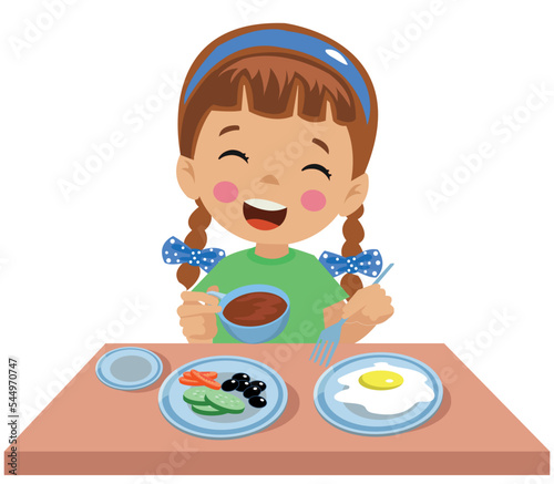 cute little boy having breakfast