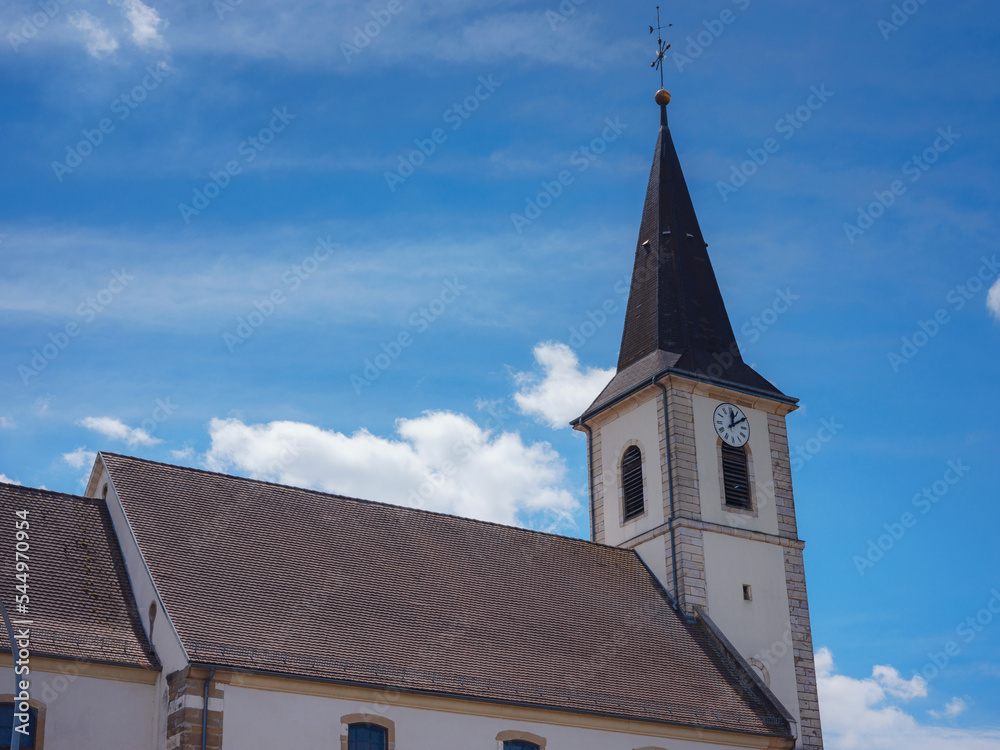 Fototapeta premium Conques village in France in summer day. the small town of Walshwiller in France. Church of the Eglise de Wolschwiller