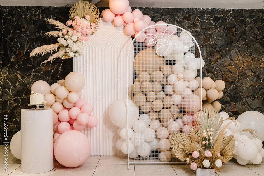 Birthday decorations - balloons, garland and decor for little baby party on  a wall background. Celebration baptism concept. Baby text. Trendy Cake.  Stock Photo | Adobe Stock