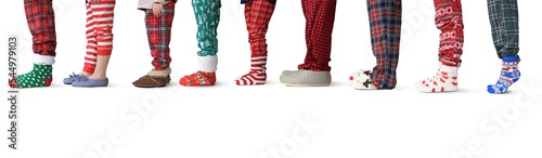 Christmas. A large family all together in pajamas and slippers is standing in line for gifts. photo