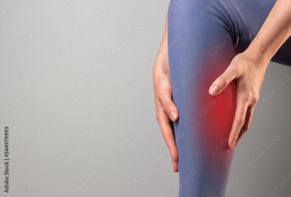 Calf pain, shin muscles spasm, cramp, sprain. Sport trauma, injury of