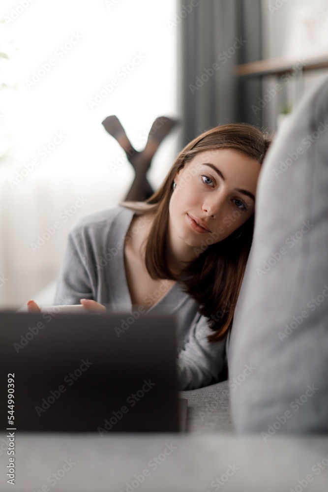 Woman resting with laptop Woman resting with laptop