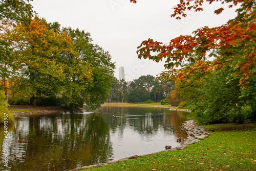 Autumn in Slottsparken park in Malmo, Sweden with Turning Torso in background photo
