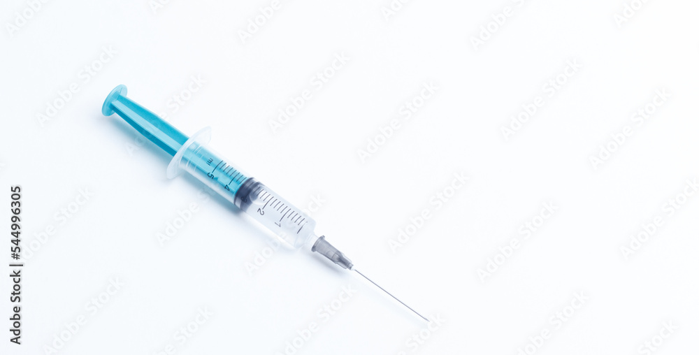 Disposable plastic syringe prepared for injection and vaccination in the hospital. The concept of medicine and health Disposable plastic syringe prepared for injection and vaccination in the hospital. The concept of medicine and health