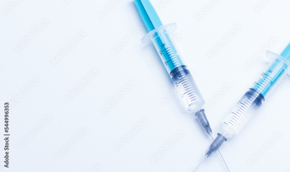 Disposable plastic syringe prepared for injection and vaccination in the hospital. The concept of medicine and health Disposable plastic syringe prepared for injection and vaccination in the hospital. The concept of medicine and health