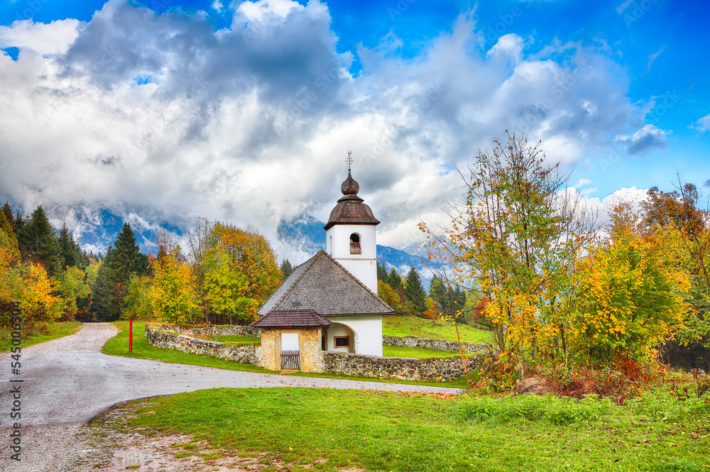 Picturesque view on Church of St. Catherine on Hom hill near Zasip. Popular tourist destination. Location: Zasip, Upper Carniolan region, Slovenia, Europe