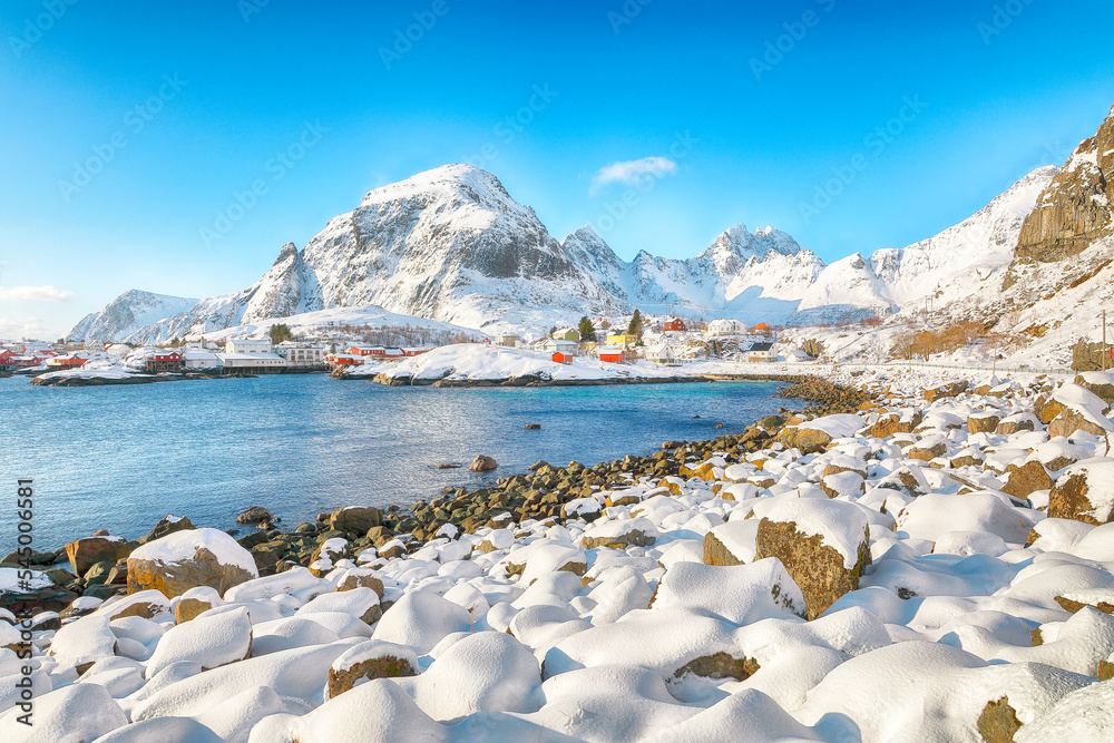 Naklejka premium Attractive winter scenery of A village. Norwegian fishing village, with the typical rorbu houses .