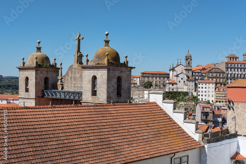 The rooftop of the church and convent Igreja dos Grijos, and surrounding old buildings and monuments as seen from the lookout Terreiro da Se, near the cathedral in Porto, Portugal