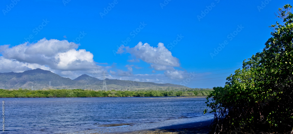Tropical Island view in the sea and blue sky Tropical Island view in the sea and blue sky
