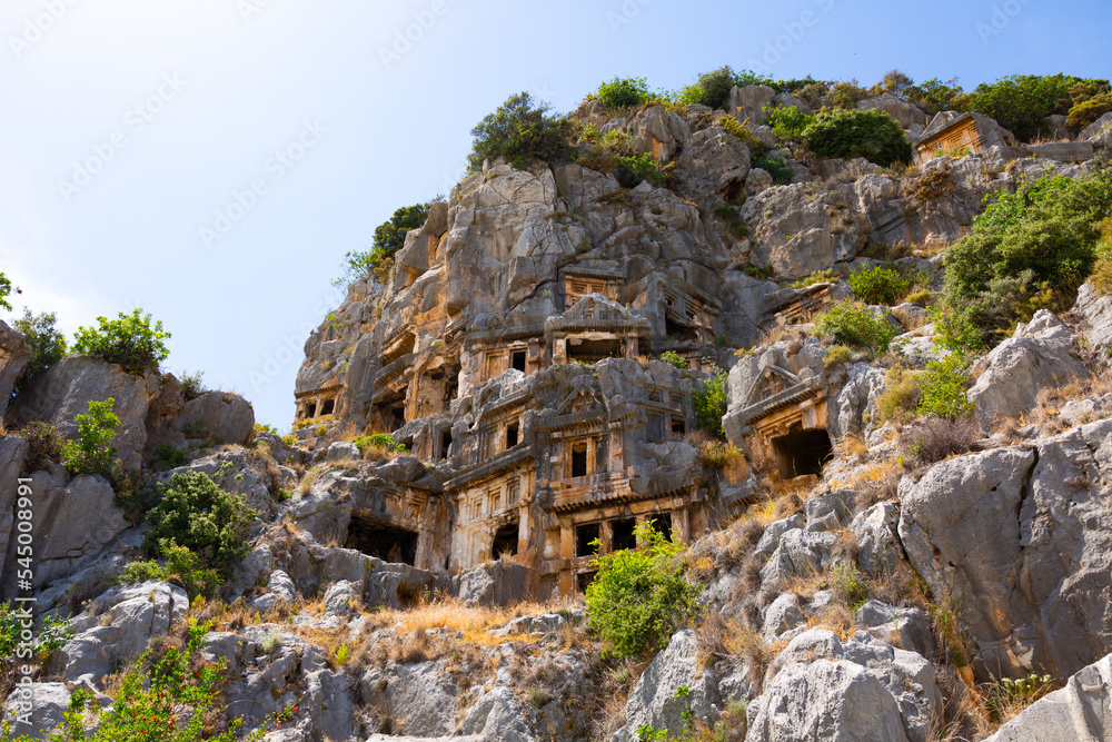 Lycian rock-cut tombs carved into vertical cliffs at Myra, modern Demre, Antalya province, Turkey.