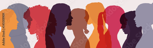Society of multiethnic women and girls. Friendship and communication between women of different cultures and ages. Woman profile silhouette.
